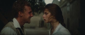 Movie still from “Tess” (1979), directed by Roman Polanski – A man and a woman face to face in the street; Close Up shot, Over the shoulder angle