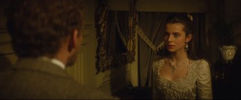 Movie still from “Tess” (1979), directed by Roman Polanski – A man and a woman in front of a mirror; Medium shot, Over the shoulder angle