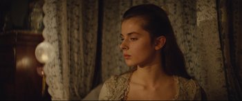 Movie still from “Tess” (1979), directed by Roman Polanski – A young woman is looking into the distance; Close Up shot, Over the shoulder angle