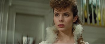 Movie still from “Tess” (1979), directed by Roman Polanski – A person wearing a dress; Close Up shot, Over the shoulder angle