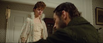 Movie still from “Tess” (1979), directed by Roman Polanski – A man and a woman are looking at each other; Medium shot, Over the shoulder angle