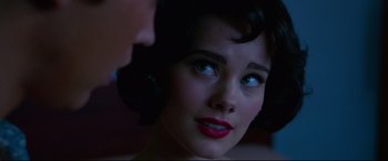 Movie still from “Elvis” (2022), directed by Baz Luhrmann – A person looking at the camera; Close Up shot, Over the shoulder angle