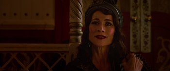 Movie still from “Elvis” (2022), directed by Baz Luhrmann – A person wearing a headpiece; Close Up shot, Over the shoulder angle