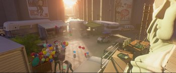 Movie still from “Elvis” (2022), directed by Baz Luhrmann – A view of an outdoor area with a lot of balloons; Extreme Wide shot, High angle