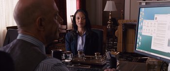 Movie still from “The Accountant” (2016), directed by Gavin O'Connor – Medium shot, Over the shoulder angle