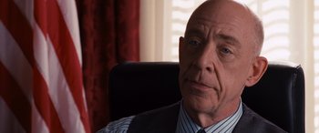 Movie still from “The Accountant” (2016), directed by Gavin O'Connor – Close Up shot, Over the shoulder angle