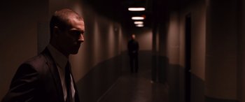 Movie still from “The Accountant” (2016), directed by Gavin O'Connor – Medium shot, Over the shoulder angle