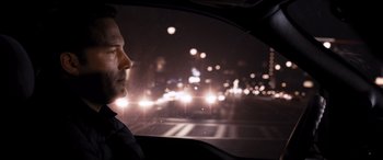 Movie still from “The Accountant” (2016), directed by Gavin O'Connor – Close Up shot, Over the shoulder angle