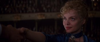 Movie still from “The Age of Innocence” (1993), directed by Martin Scorsese – A woman's face in front of an audience; Close Up shot, Over the shoulder angle