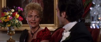 Movie still from “The Age of Innocence” (1993), directed by Martin Scorsese – A man and a woman are talking to each other; Close Up shot, Over the shoulder angle