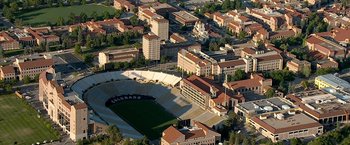 Movie still from “The Big Short” (2015), directed by Adam McKay – An aerial view of a stadium in a large city; Extreme Wide shot, High angle