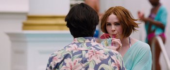 Movie still from “The Big Short” (2015), directed by Adam McKay – A man and a woman are drinking a drink together; Close Up shot, Over the shoulder angle