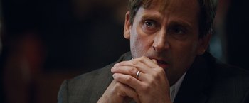 Movie still from “The Big Short” (2015), directed by Adam McKay – A person with a ring on his finger; Close Up shot, Low angle