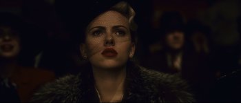 Movie still from “The Black Dahlia” (2006), directed by Brian De Palma – A person wearing a hat with a veil; Close Up shot, Low angle