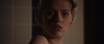 Movie still from “The Black Dahlia” (2006), directed by Brian De Palma – A beautiful young woman with a serious look; Close Up shot, Low angle