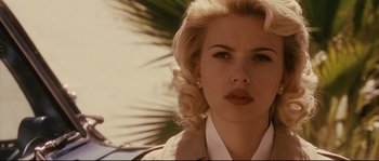 Movie still from “The Black Dahlia” (2006), directed by Brian De Palma – A person wearing a jacket; Close Up shot, Over the shoulder angle