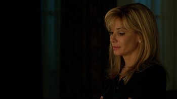 Movie still from “The Blind Side” (2009), directed by John Lee Hancock – A blonde woman is looking to her left; Close Up shot, Over the shoulder angle