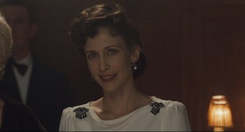 Movie still from “The Boy in the Striped Pajamas” (2008), directed by Mark Herman – A person wearing a white shirt; Close Up shot, Over the shoulder angle