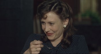 Movie still from “The Boy in the Striped Pajamas” (2008), directed by Mark Herman – A person wearing a ring; Close Up shot, Over the shoulder angle