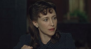 Movie still from “The Boy in the Striped Pajamas” (2008), directed by Mark Herman – A person wearing a polka dot shirt; Close Up shot, Over the shoulder angle