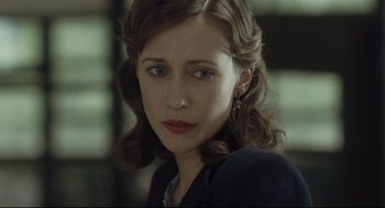 Movie still from “The Boy in the Striped Pajamas” (2008), directed by Mark Herman – A person wearing a black shirt; Close Up shot, Over the shoulder angle