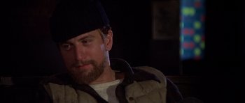 Movie still from “The Deer Hunter” (1978), directed by Michael Cimino – A person wearing a hat; Close Up shot, Over the shoulder angle