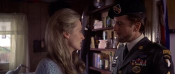 Movie still from “The Deer Hunter” (1978), directed by Michael Cimino – A man and a woman are looking at each other; Close Up shot, Over the shoulder angle