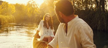 Movie still from “10 Days of a Good Man” (2023), directed by Uluç Bayraktar – A man and a woman on a boat in the water; Medium shot, Over the shoulder angle