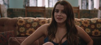 Movie still from “10 Days of a Good Man” (2023), directed by Uluç Bayraktar – A beautiful young lady sitting on top of a couch; Close Up shot, Over the shoulder angle