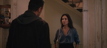 Movie still from “10 Days of a Good Man” (2023), directed by Uluç Bayraktar – A man and a woman standing next to each other; Medium shot, Over the shoulder angle