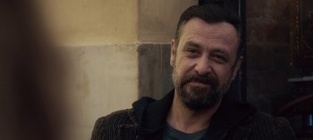 Movie still from “10 Days of a Good Man” (2023), directed by Uluç Bayraktar – A person with a beard; Close Up shot, Low angle