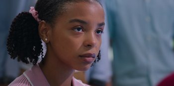 Movie still from “13: The Musical” (2022), directed by Tamra Davis – A person with blue eyes; Close Up shot, Over the shoulder angle
