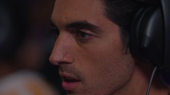 Movie still from “1UP” (2022), directed by Kyle Newman – A young man's face; Extreme Close Up shot, High angle