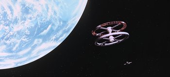 Movie still from “2001: A Space Odyssey” (1968), directed by Stanley Kubrick – An image of a space station in the space; Extreme Wide shot, High angle