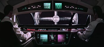 Movie still from “2001: A Space Odyssey” (1968), directed by Stanley Kubrick – A view of a space station from the cockpit; Wide shot, Overhead angle
