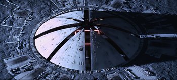 Movie still from “2001: A Space Odyssey” (1968), directed by Stanley Kubrick – A view of a star wars millennium falcon from above; Extreme Wide shot, Overhead angle