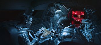 Movie still from “2001: A Space Odyssey” (1968), directed by Stanley Kubrick – A group of people sitting at a table in a room; Medium shot, Overhead angle
