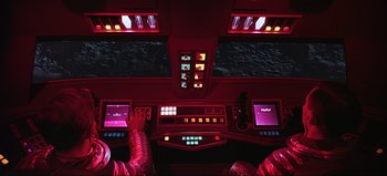 Movie still from “2001: A Space Odyssey” (1968), directed by Stanley Kubrick – A view from the top of a ship's bridge of the controls; Wide shot, Overhead angle