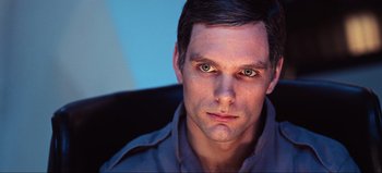 Movie still from “2001: A Space Odyssey” (1968), directed by Stanley Kubrick – A person wearing a blue shirt; Close Up shot, Low angle