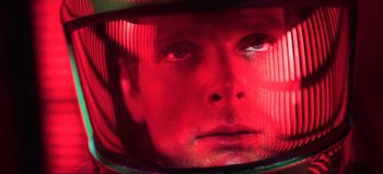 Movie still from “2001: A Space Odyssey” (1968), directed by Stanley Kubrick – A person wearing a helmet; Close Up shot, Overhead angle