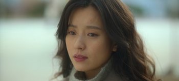 Movie still from “20th Century Girl” (2022), directed by Woo-ri Bang – A person with long hair; Close Up shot, Low angle