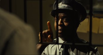 Movie still from “The Double” (2013), directed by Richard Ayoade – Close Up shot, Over the shoulder angle