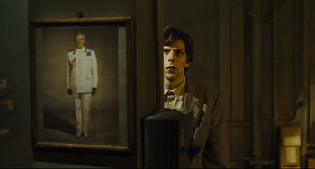 Movie still from “The Double” (2013), directed by Richard Ayoade – Medium shot, Over the shoulder angle