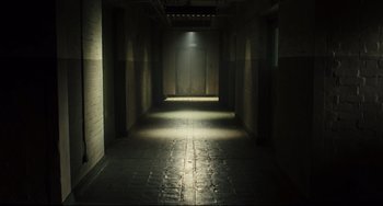 Movie still from “The Double” (2013), directed by Richard Ayoade – Wide shot, Low angle