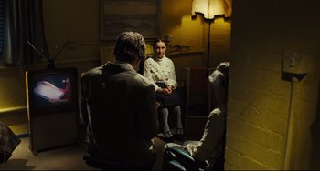 Movie still from “The Double” (2013), directed by Richard Ayoade – Wide shot, Over the shoulder angle