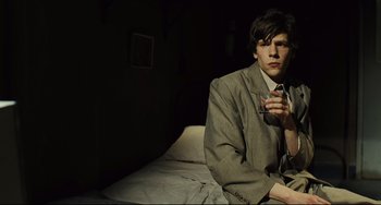 Movie still from “The Double” (2013), directed by Richard Ayoade – Medium shot, Low angle