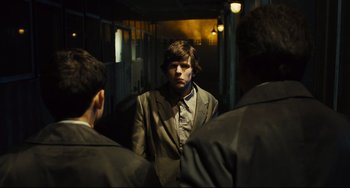 Movie still from “The Double” (2013), directed by Richard Ayoade – Medium shot, Over the shoulder angle
