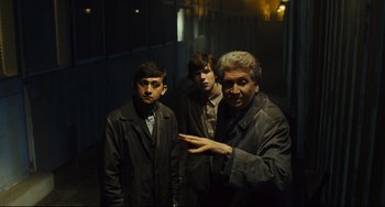 Movie still from “The Double” (2013), directed by Richard Ayoade – Medium shot, High angle