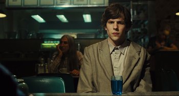Movie still from “The Double” (2013), directed by Richard Ayoade – Medium shot, Over the shoulder angle