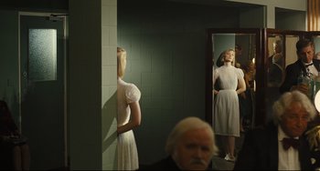 Movie still from “The Double” (2013), directed by Richard Ayoade – Medium shot, Over the shoulder angle